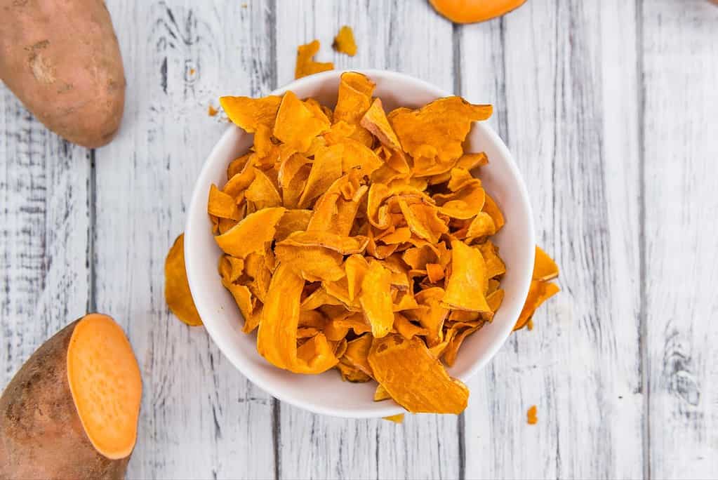 Dog-friendly dried sweet potato treats for healthy snacking and dental health.