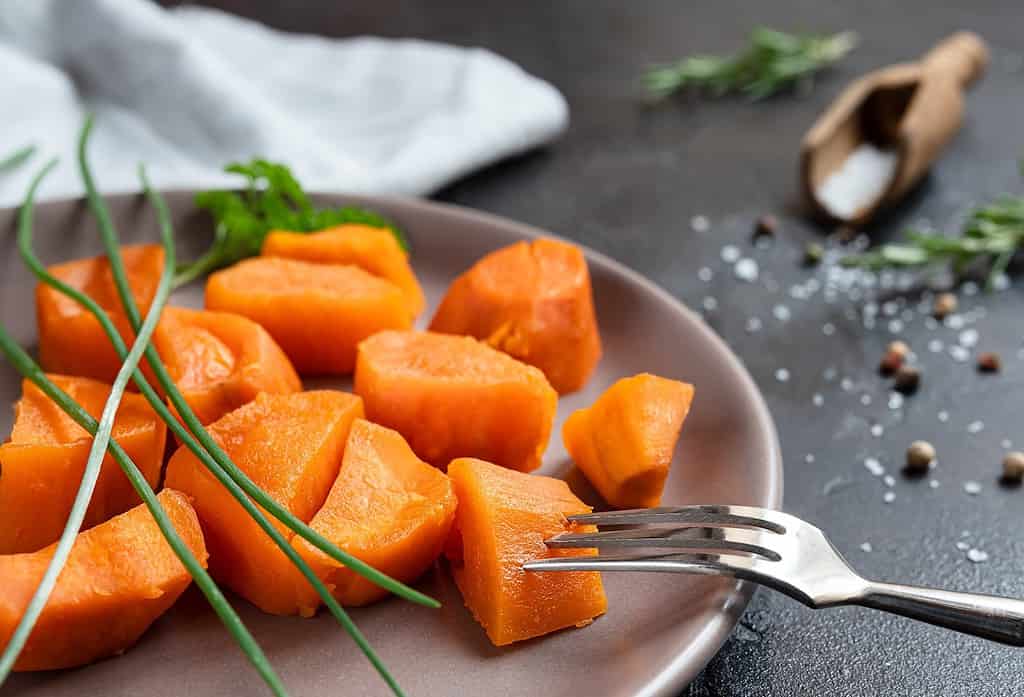 Freshly prepared sweet potatoes for healthy dog diets, perfect for natural pet nutrition.