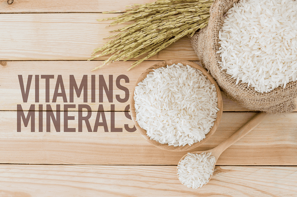 High-quality dog vitamins and minerals with rice and wheat on wood.