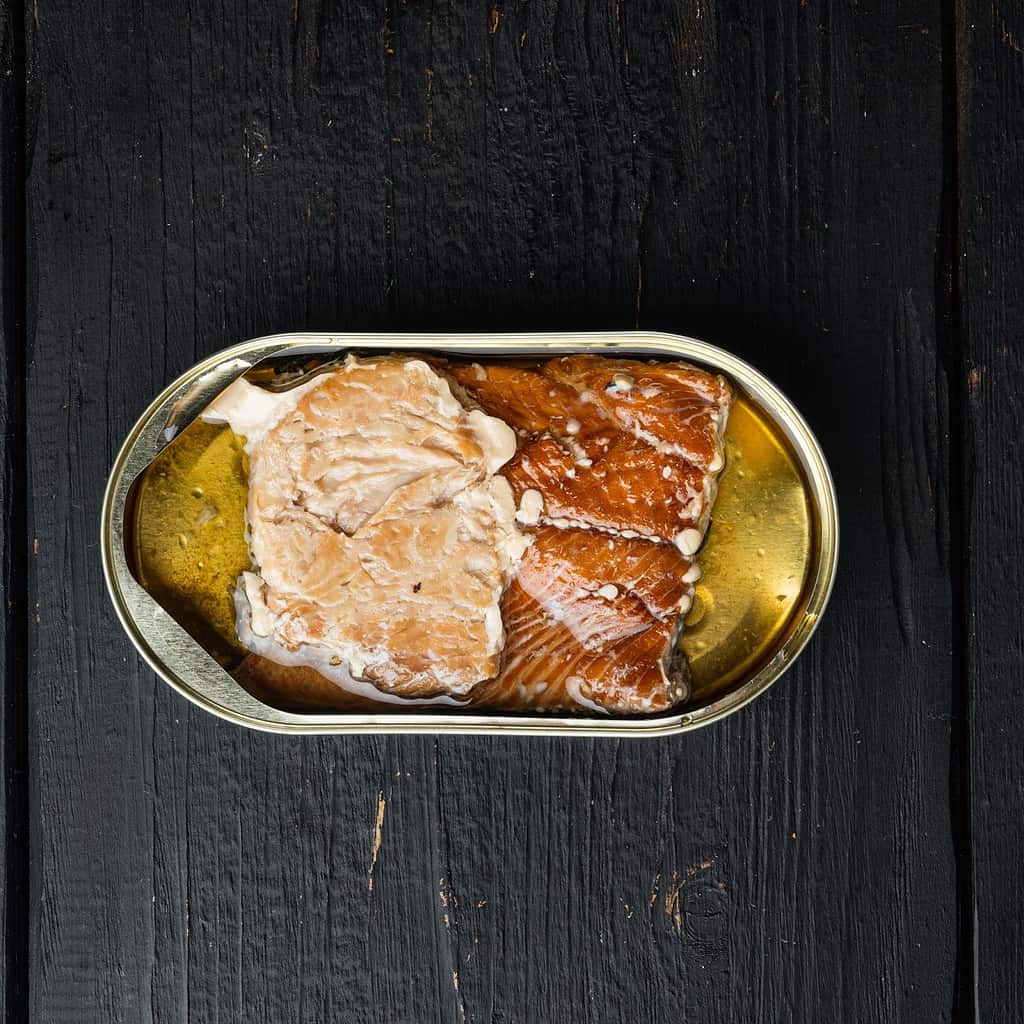 Canned fish in oil for healthy dog diet, optimal for pet nutrition and wellness.