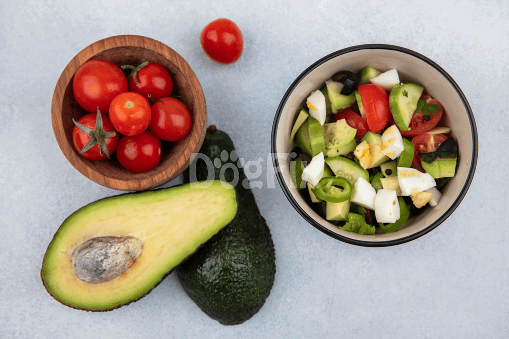 Fresh heirloom tomatoes, avocado, and vegetable salad for dogs.