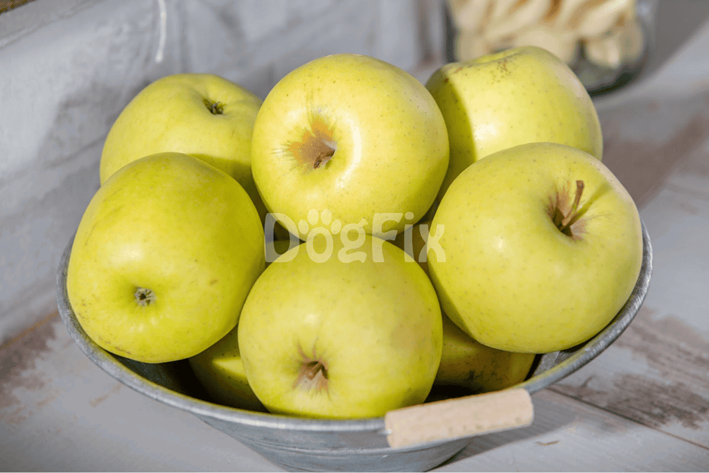 Bright yellow-green apples in a bowl, perfect for healthy snacks or cooking.