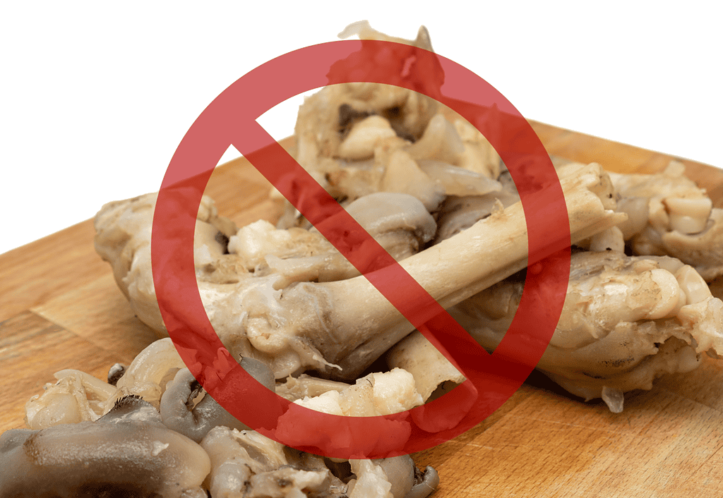 Raw chicken bones are dangerous for dogs and should be avoided to prevent health risks.