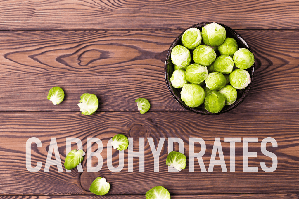 Fresh Brussels sprouts in a black bowl, perfect for healthy dog treats or meals.