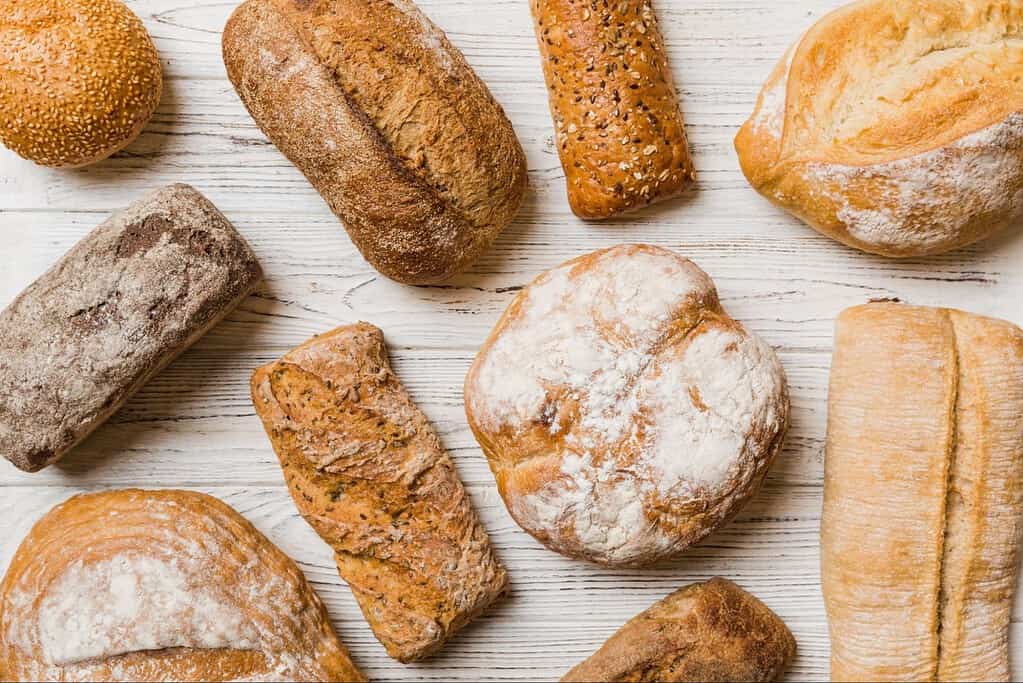 Artisan bread collection showcasing various types of fresh baked bread from a bakery.