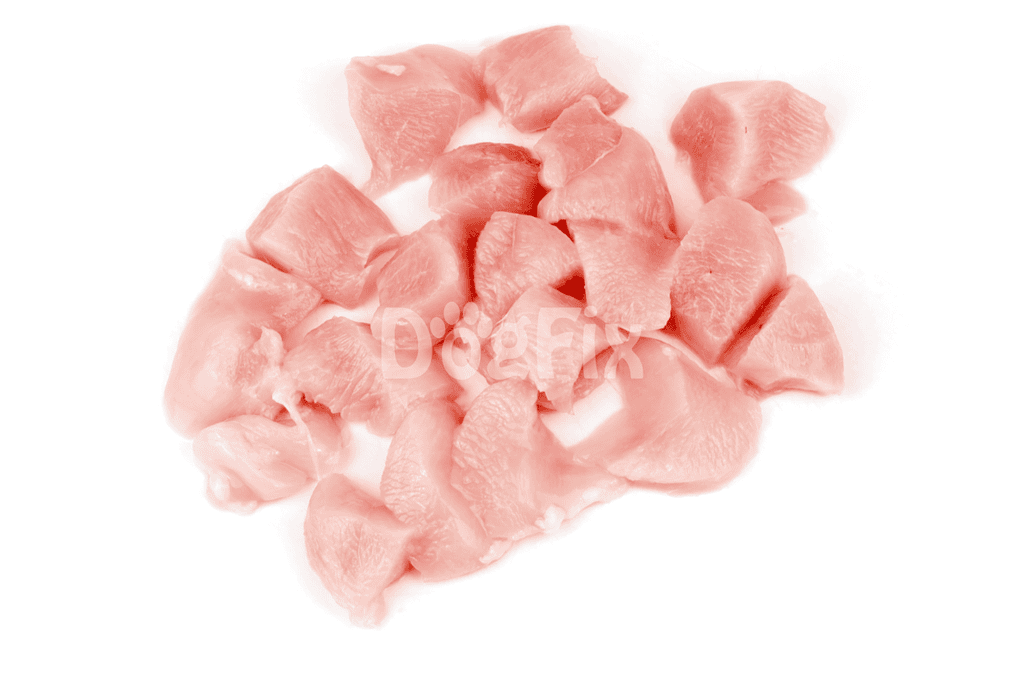 Raw chicken meat pieces for dog nutrition and wellness.