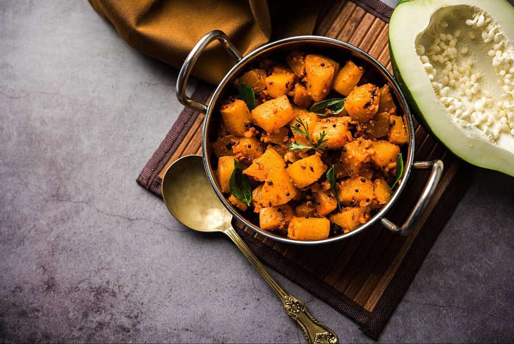 Freshly cooked sweet potatoes prepared for healthy dog meals and snacks.