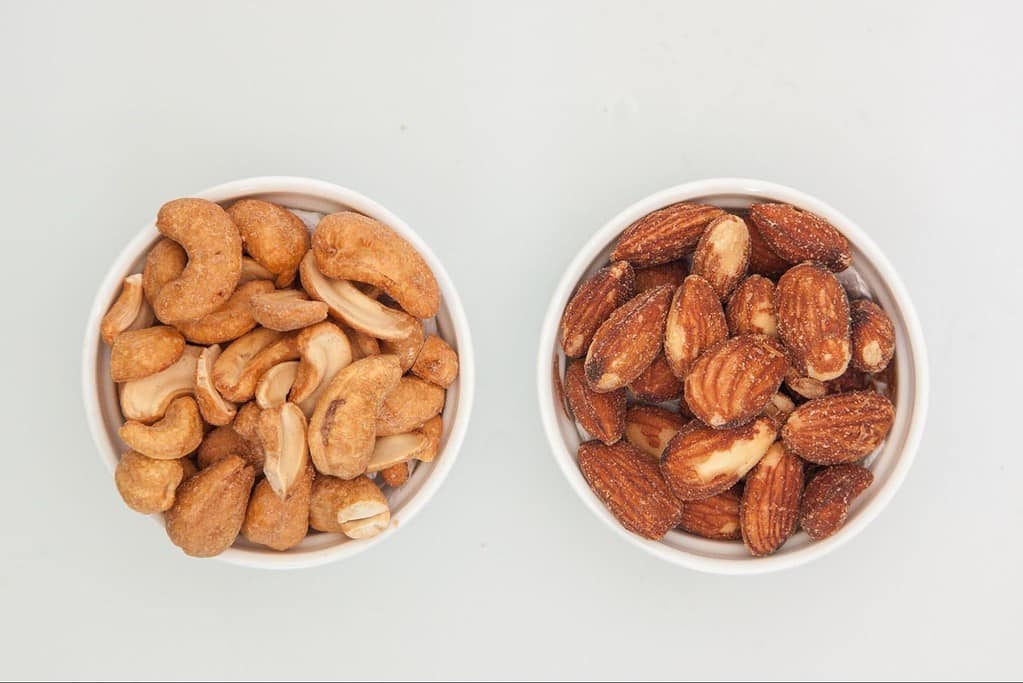 Premium snack bowls with crunchy cashews and almonds, perfect for healthy, protein-packed treats.