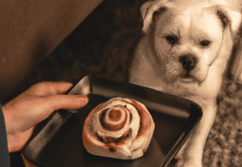Adorable puppy with a cinnamon roll treat on a black plate, relaxing at home.