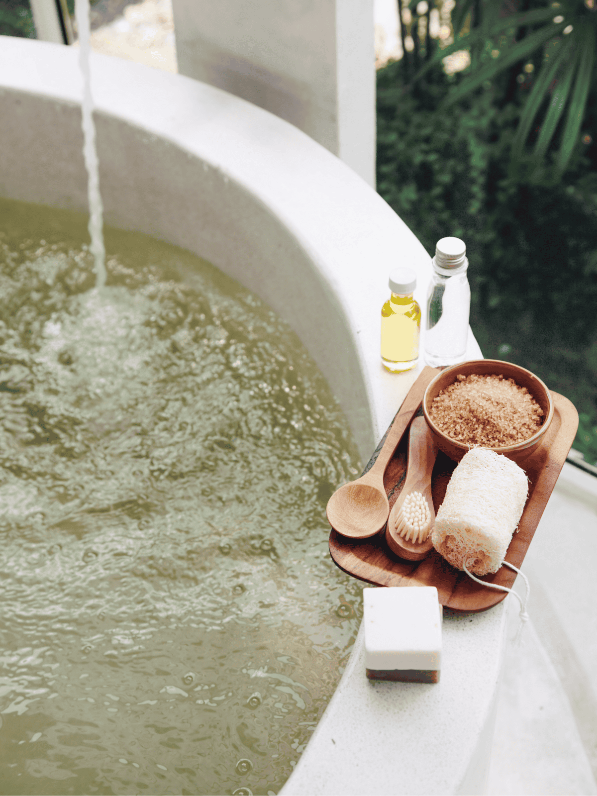 Gentle dog skincare bath with oils and exfoliating accessories for healthy, clean skin.