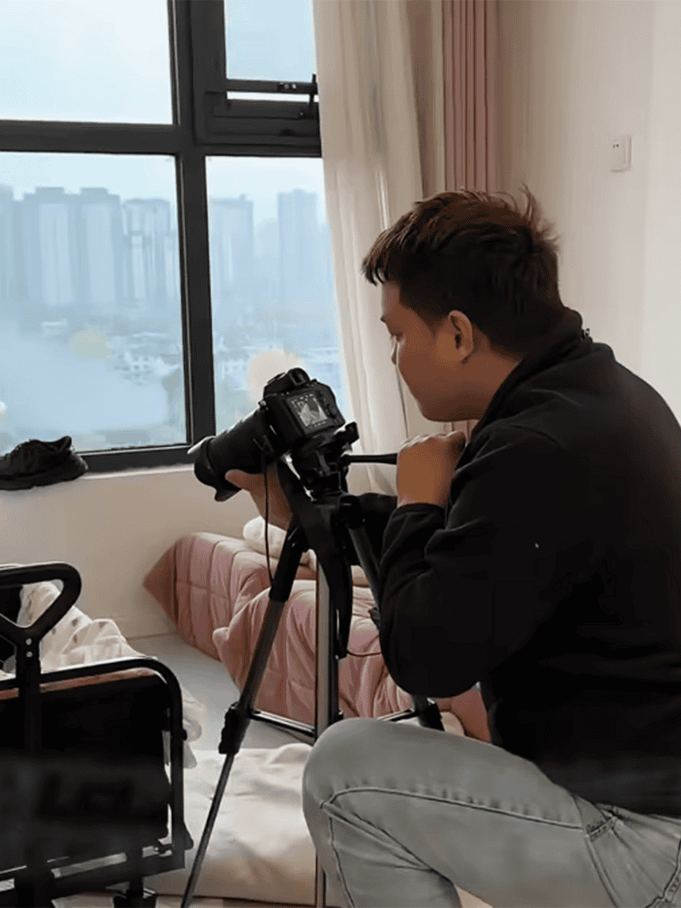 High-quality videographer capturing footage indoors for pet-related content.