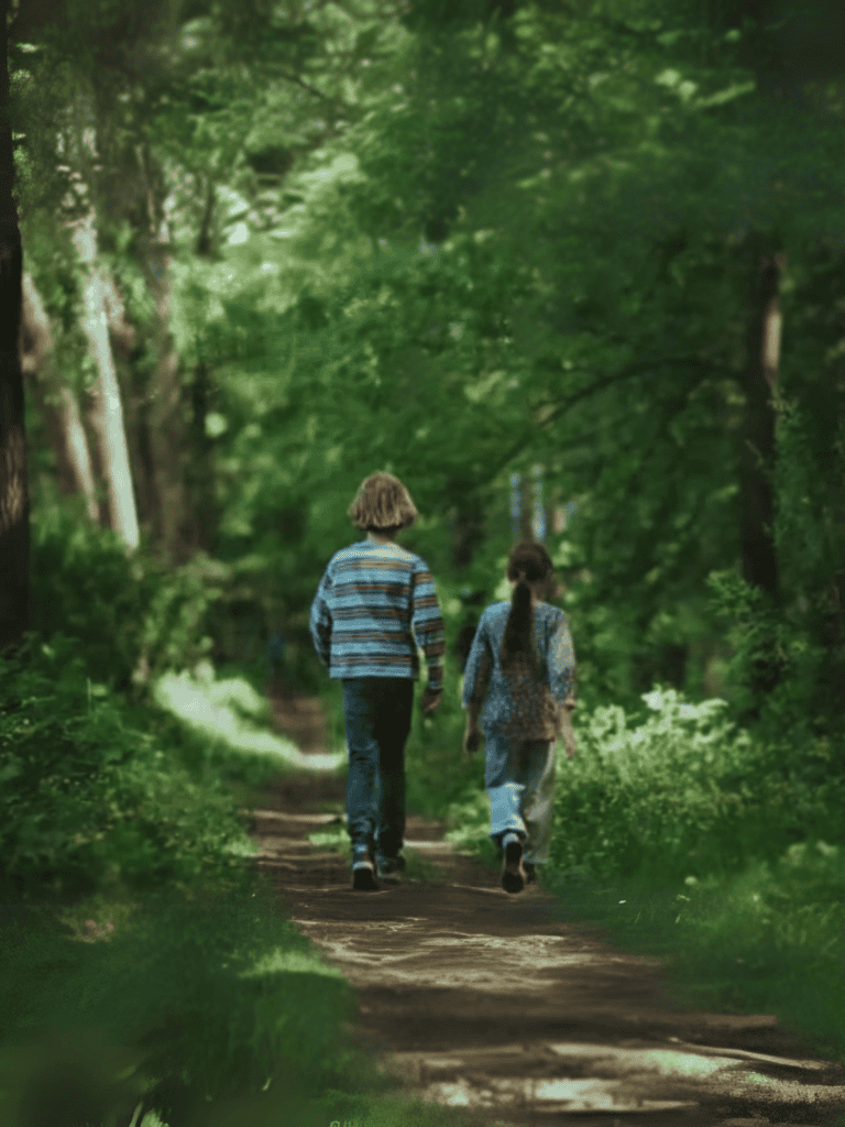 Dog-friendly outdoor walk in lush green forest.