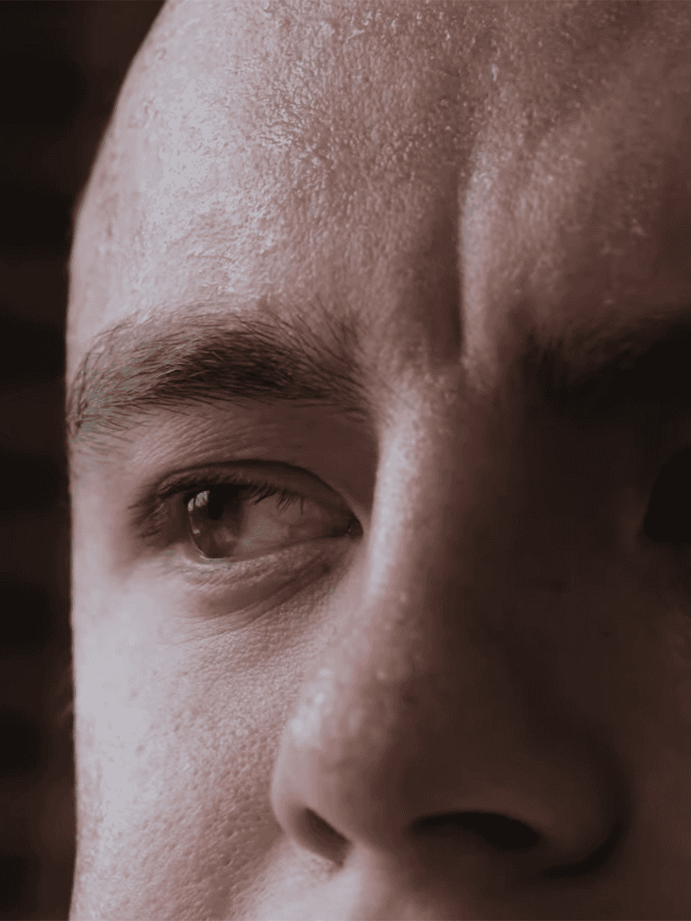 Close-up of a person's face showing skin health and skin care focus.