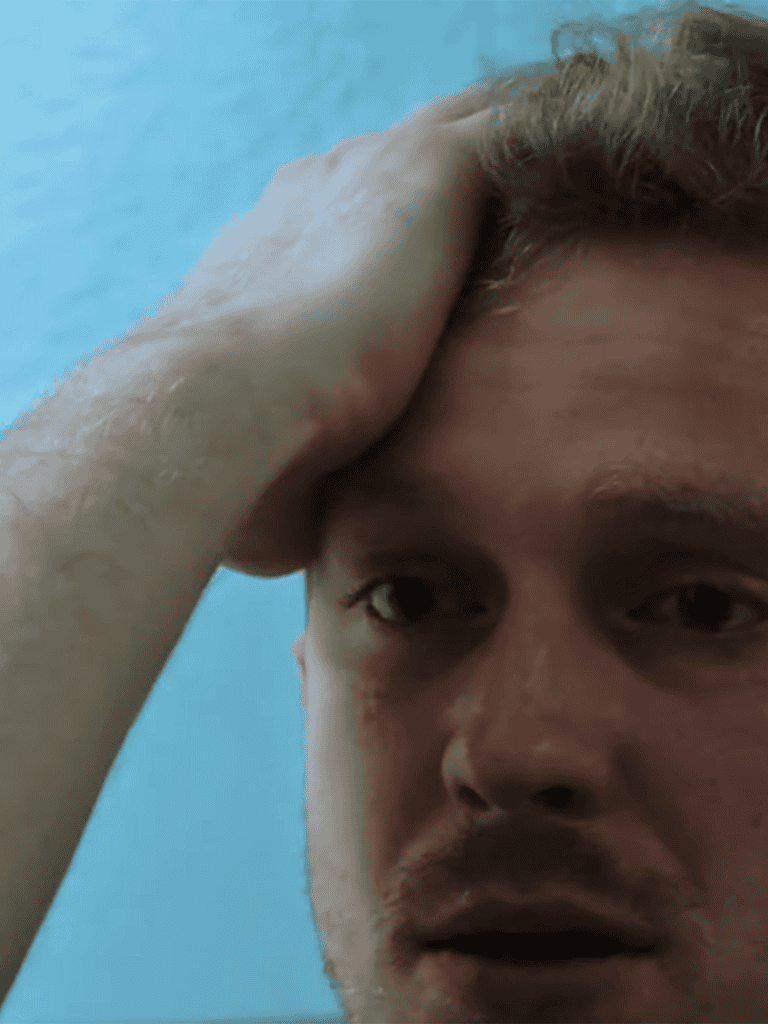 Close-up of a relaxed dog with a calm expression.