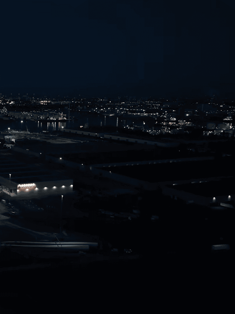 Night view of city lights and buildings at night, showcasing urban ambiance and city life.