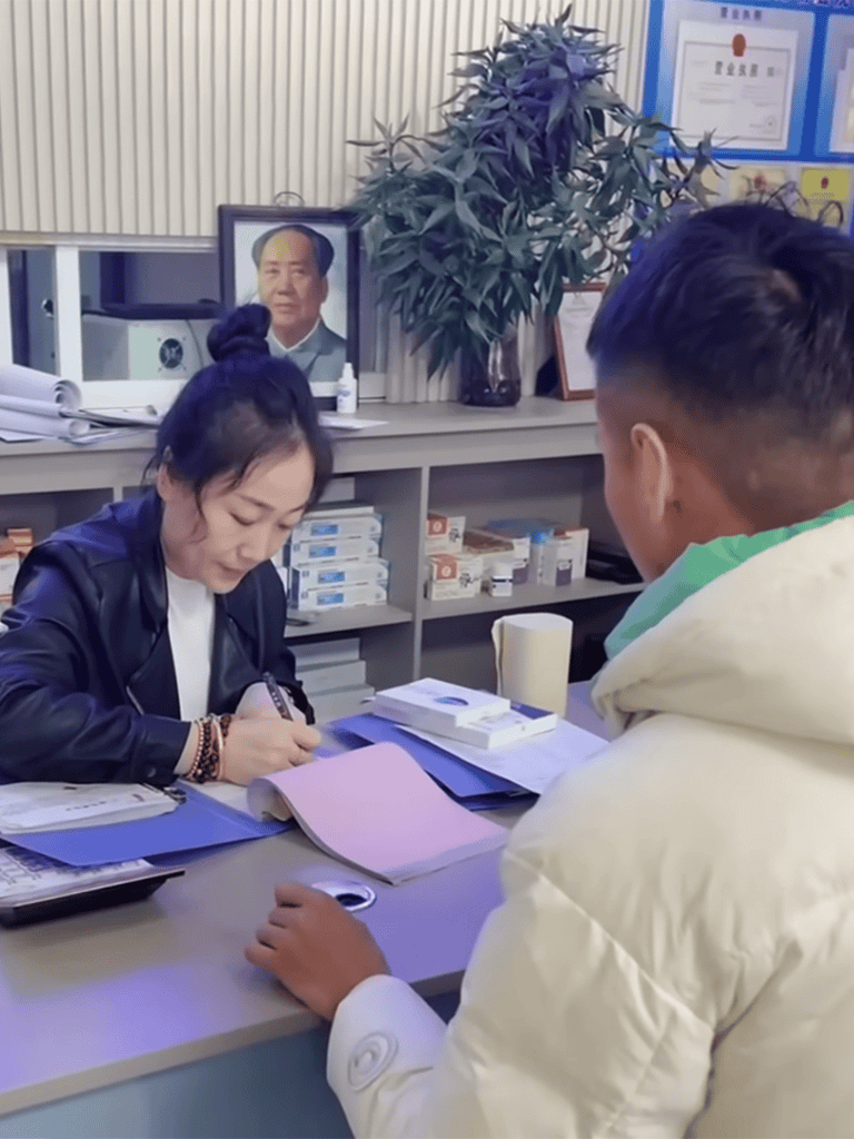A veterinarian consulting with a pet owner, reviewing documents and providing pet health advice.