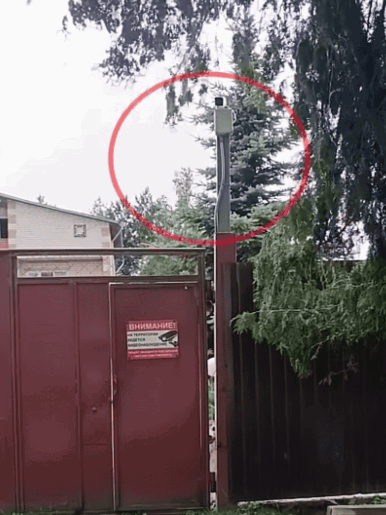 Security camera surveillance at home entrance for pet safety.