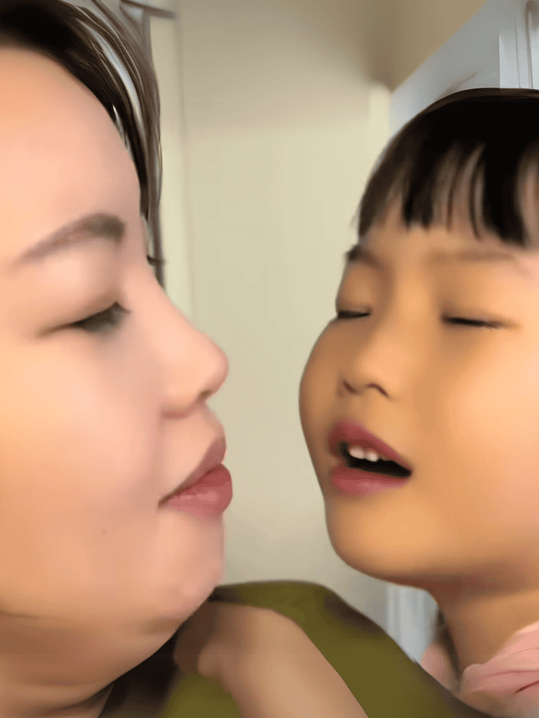 Close-up of a caring pet owner with a child's face, emphasizing pet health and wellness.